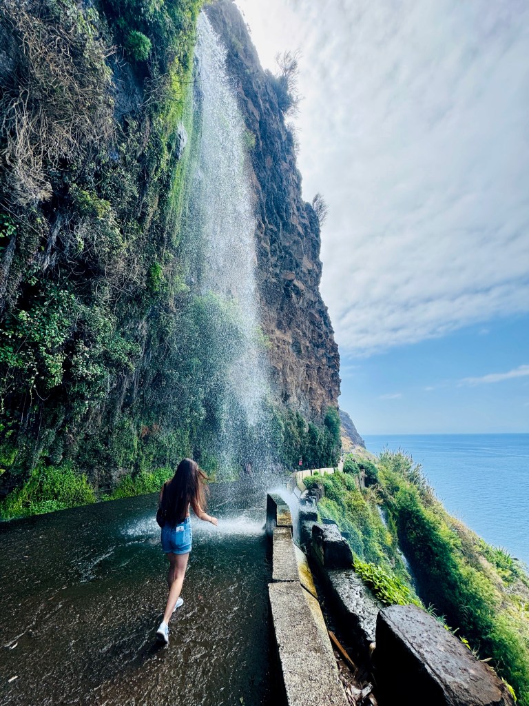 Cascata Dos Anjos: Unique waterfall that cascades onto the road.